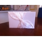 Hochzeit Gästebuch und Stift mit Elfenbein Satin Knotenentwurf gesetzt